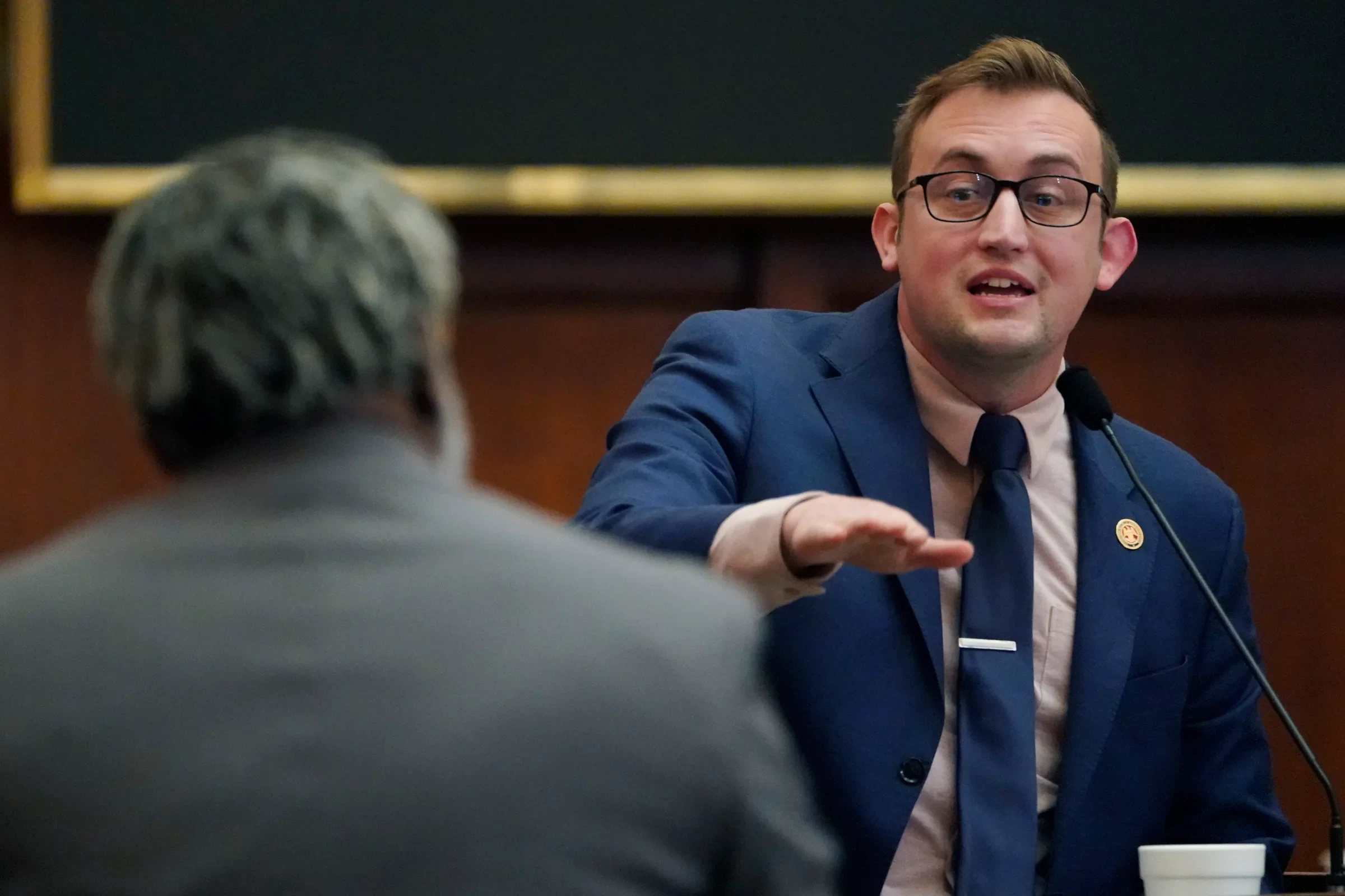 Jansen Owen speaking at a legislative hearing